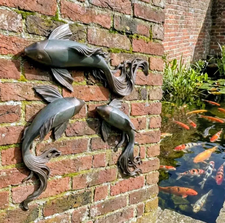 Bronze fish wall art
