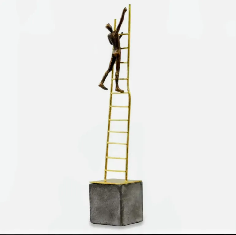 Man on gold ladder